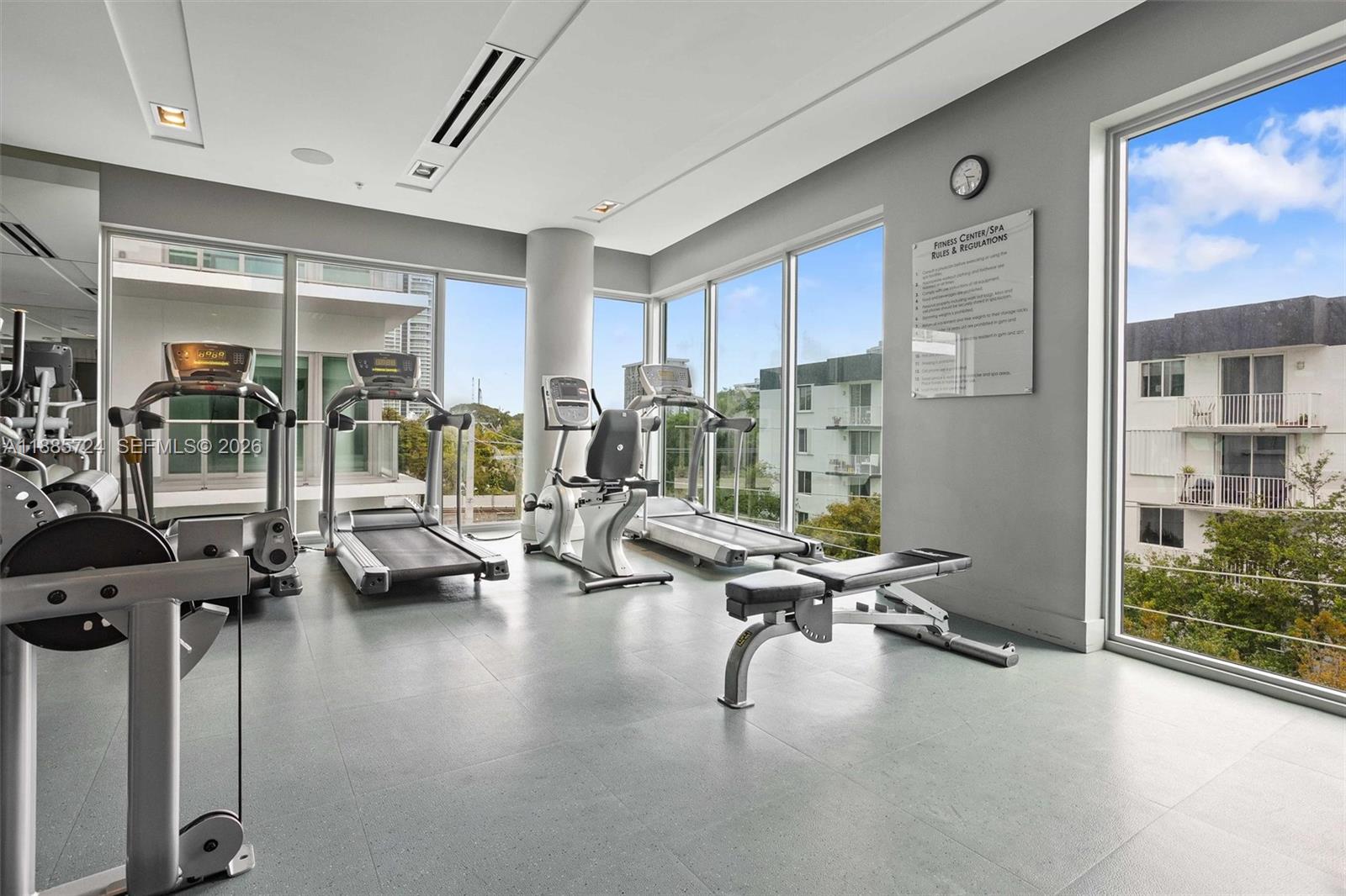 1600 Southwest 1st Avenue, Unit 704 Miami, FL 33129 - Photo 20 of 29 a view of a room with gym equipment