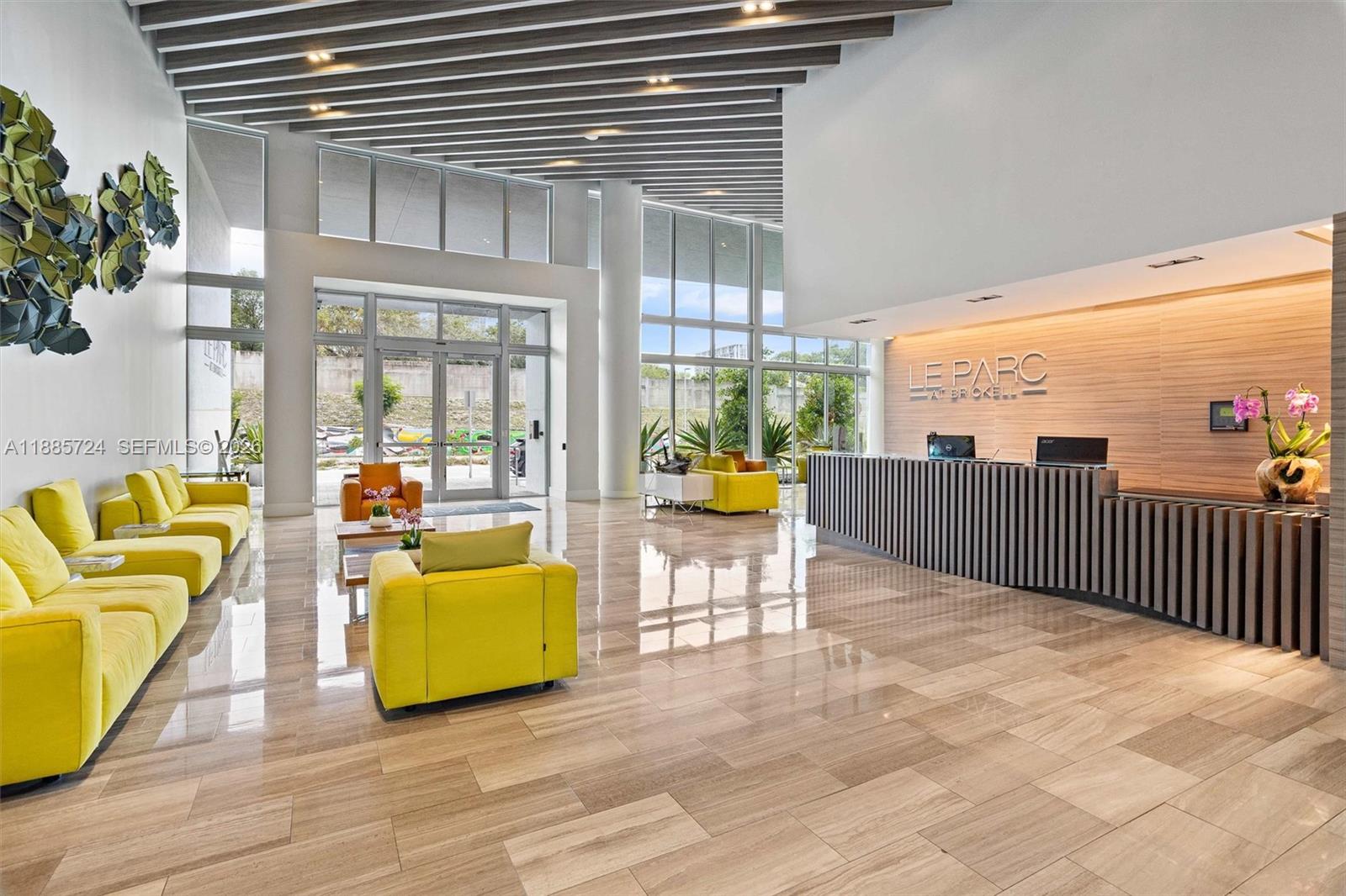 1600 Southwest 1st Avenue, Unit 704 Miami, FL 33129 - Photo 3 of 29 a view of a living room and balcony