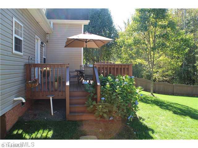 709 Barrocliff Road Clemmons, NC 27012 - Photo 14 of 16 Patio/Deck. View of the deck in summer