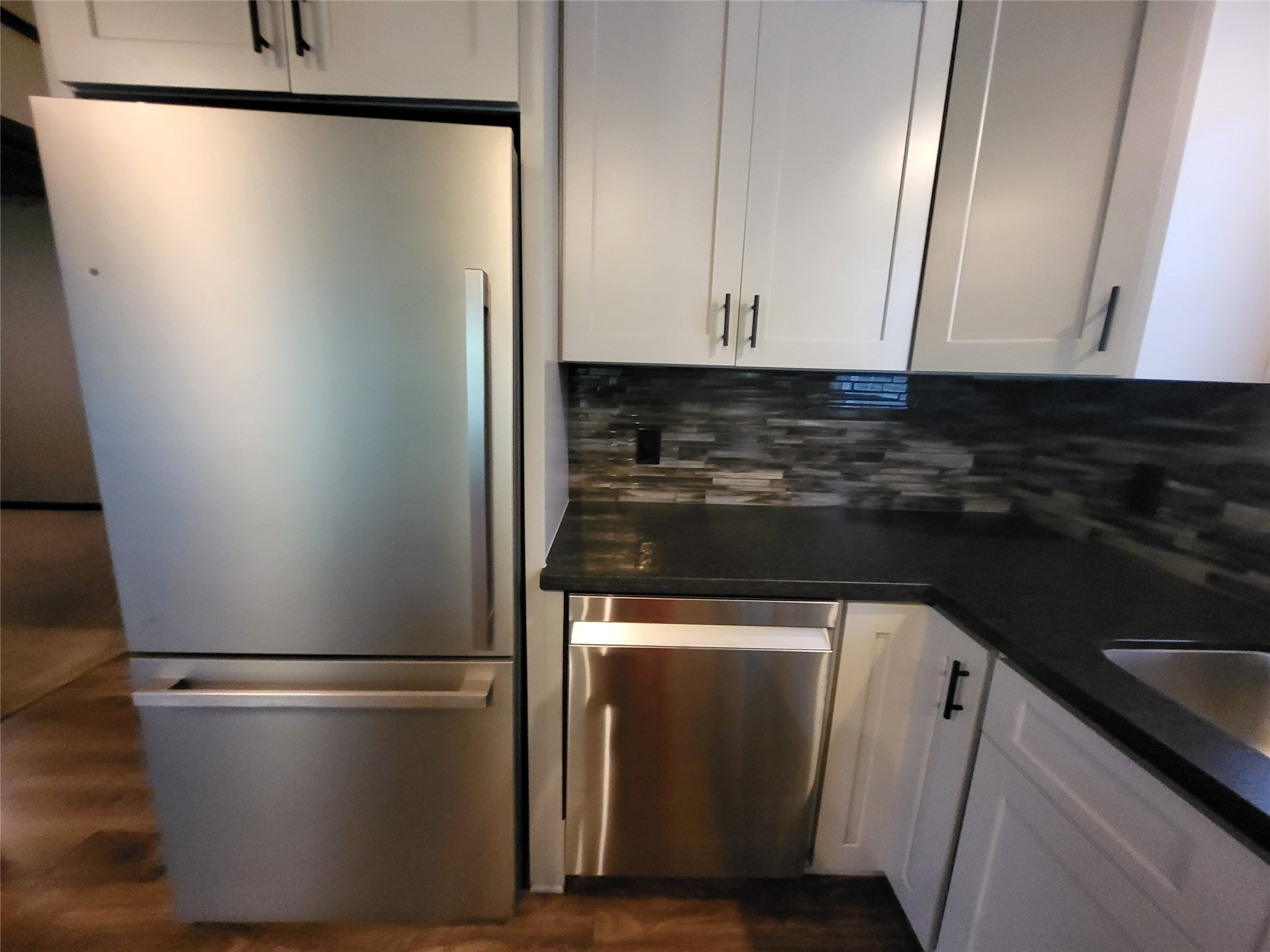 30 Ridge Creek Drive Coldspring, TX 77331 - Photo 13 of 38 a close view of stove cabinets and refrigerator