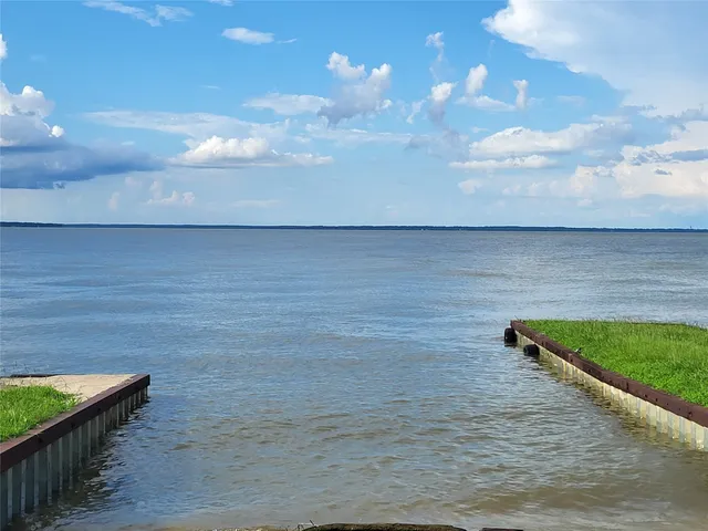 a view of swimming pool in middle of the house