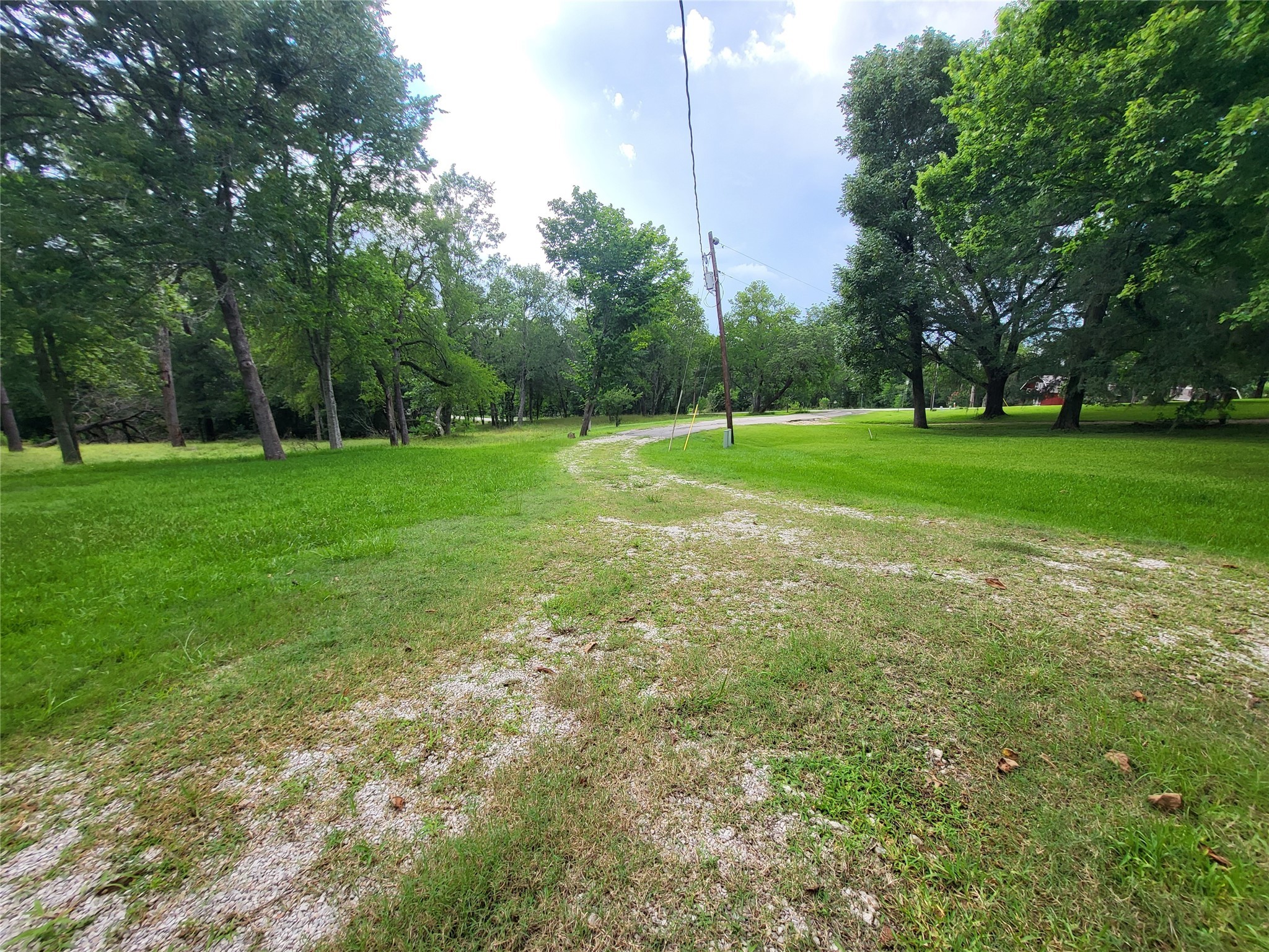 30 Ridge Creek Drive Coldspring, TX 77331 - Photo 31 of 38 a view of field with trees in the background