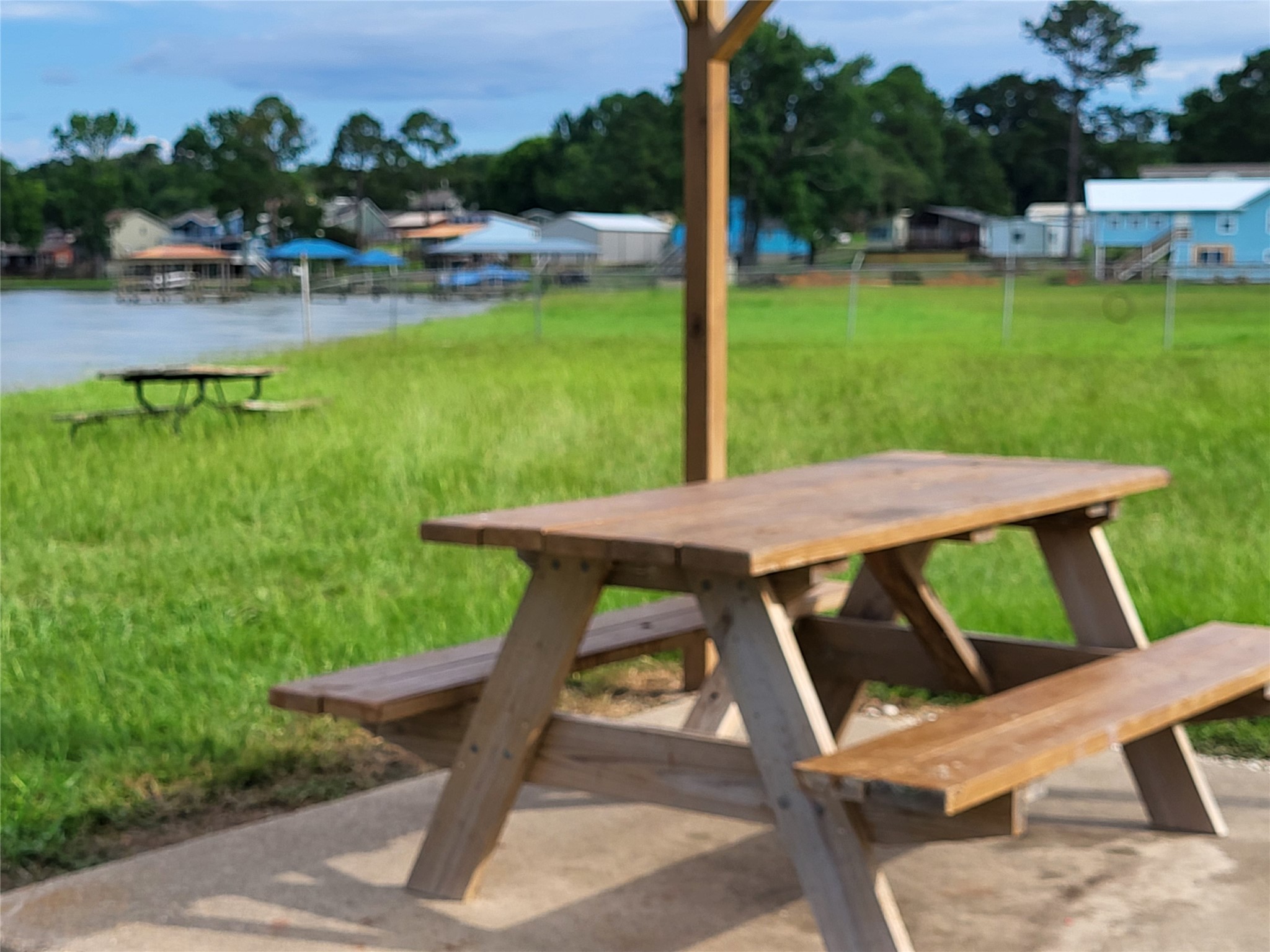 30 Ridge Creek Drive Coldspring, TX 77331 - Photo 36 of 38 a view of yard with swimming pool and outdoor seating