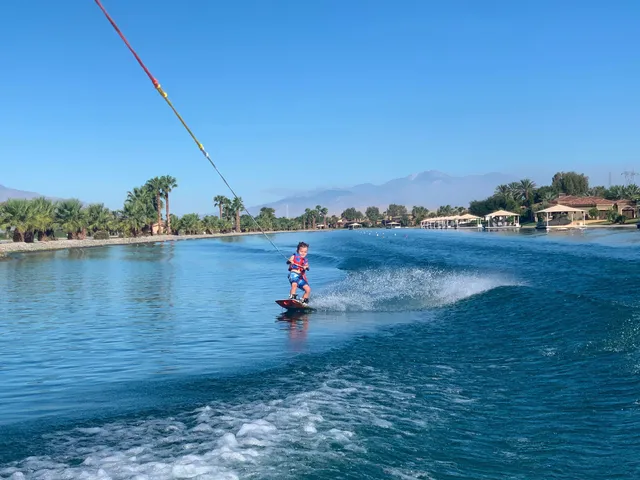 a living room with furniture and flat screen tv