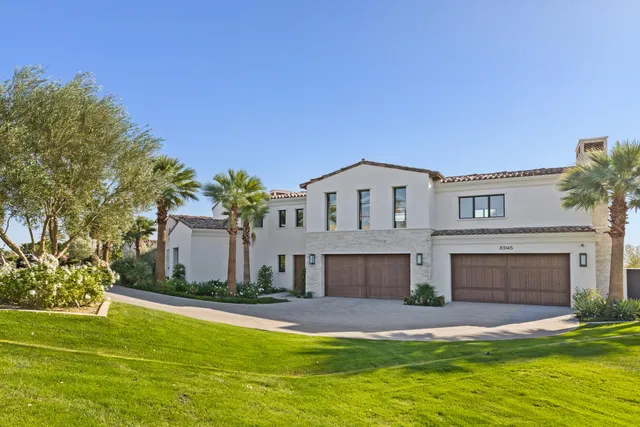 a utility room with sink dryer and washer