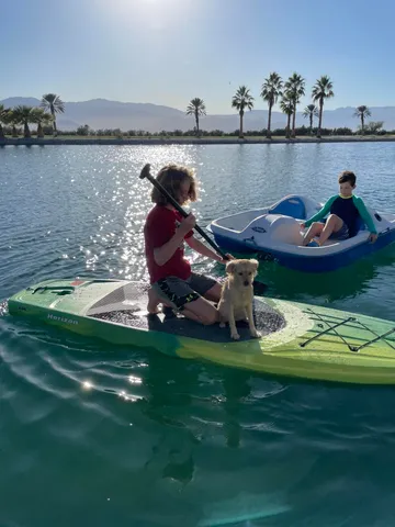 a bathroom with a bathtub and window