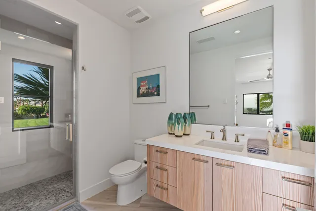 a view of a chairs and table in the patio
