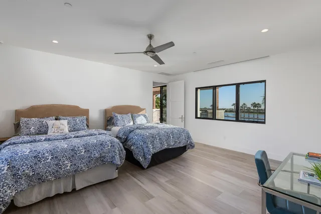 a room with gym equipment and large mirror