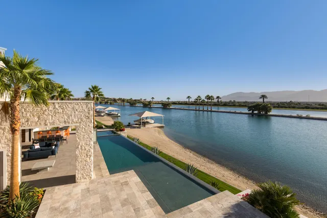 a view of a lake from a balcony