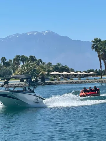 a view of a town with mountains in the background