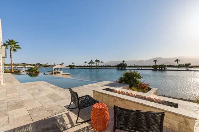 a house with a swimming pool and outdoor space