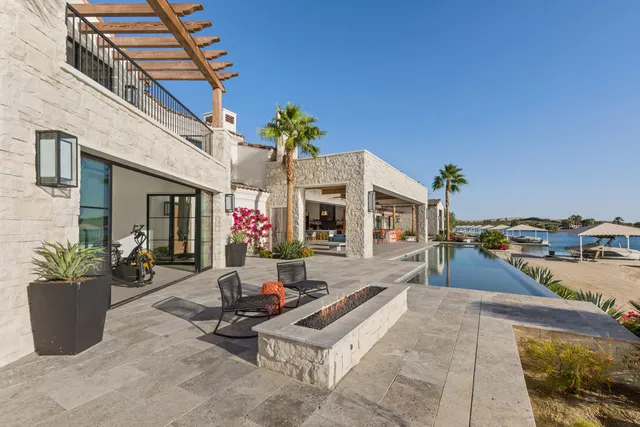 a view of a swimming pool with an ocean view