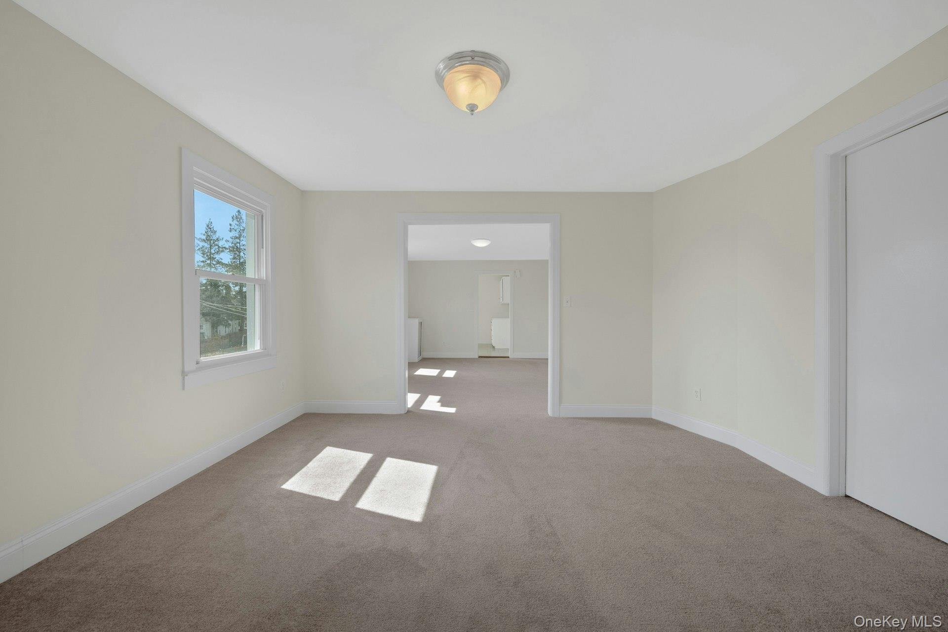 56 Stephenson Boulevard New Rochelle, NY 10801 - Photo 11 of 44 an empty room with windows and closet