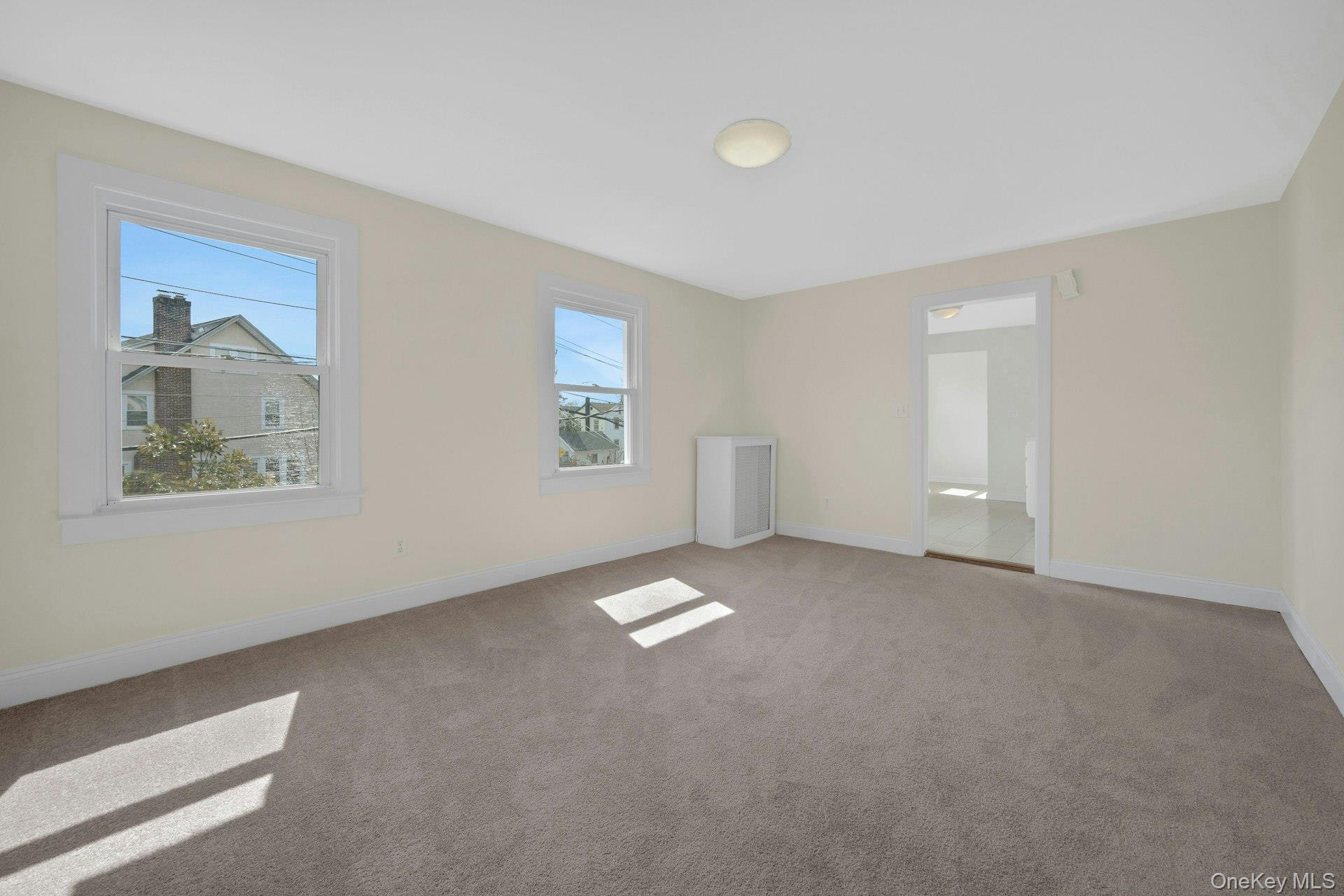 56 Stephenson Boulevard New Rochelle, NY 10801 - Photo 12 of 44 a view of an empty room with a window