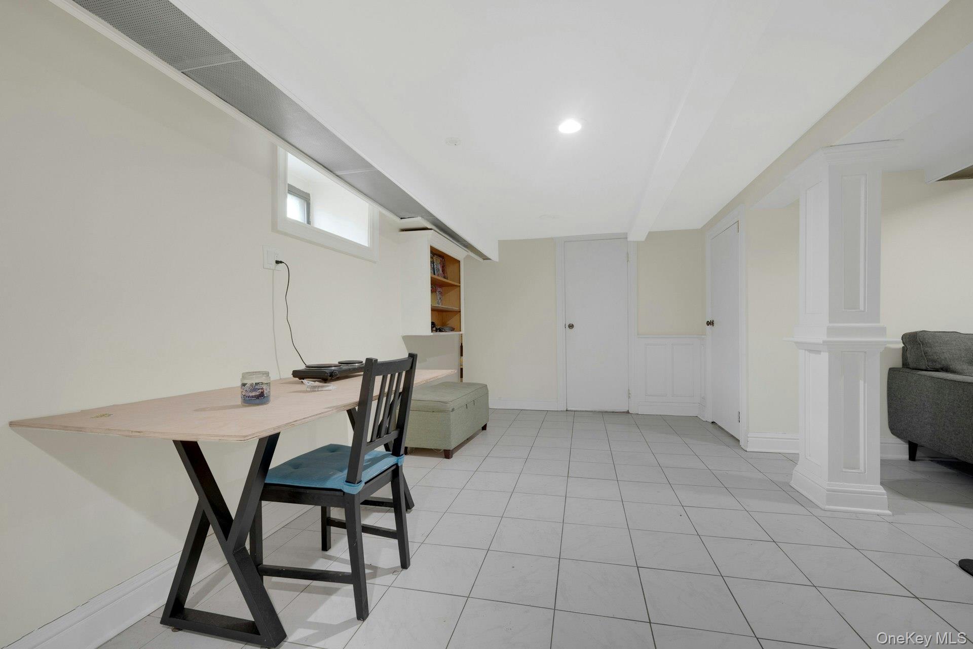 56 Stephenson Boulevard New Rochelle, NY 10801 - Photo 30 of 44 a view of a kitchen with furniture and an entryway