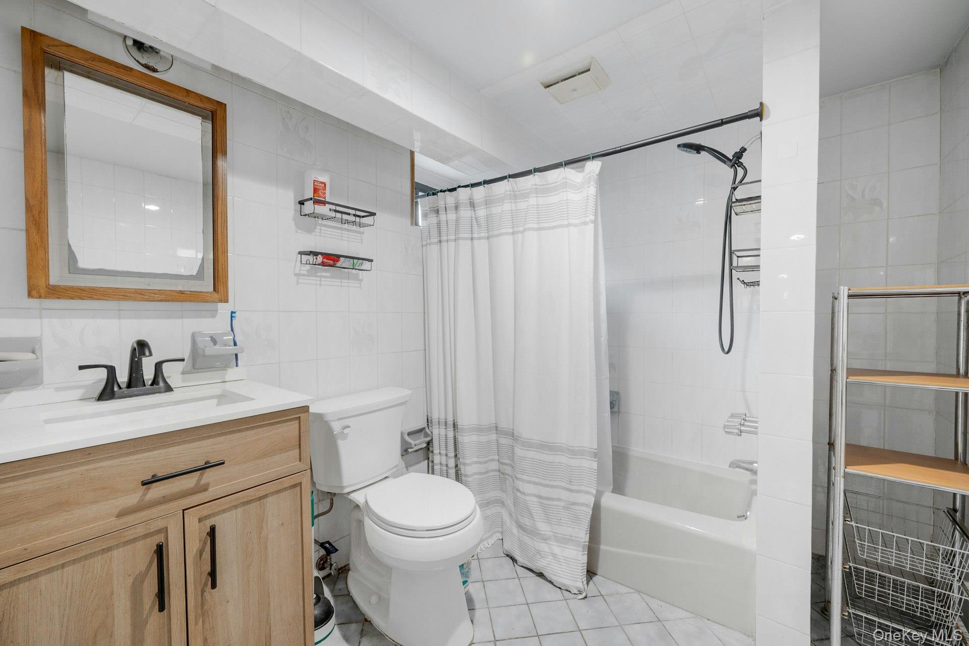 56 Stephenson Boulevard New Rochelle, NY 10801 - Photo 35 of 44 a bathroom with a granite countertop sink toilet and shower