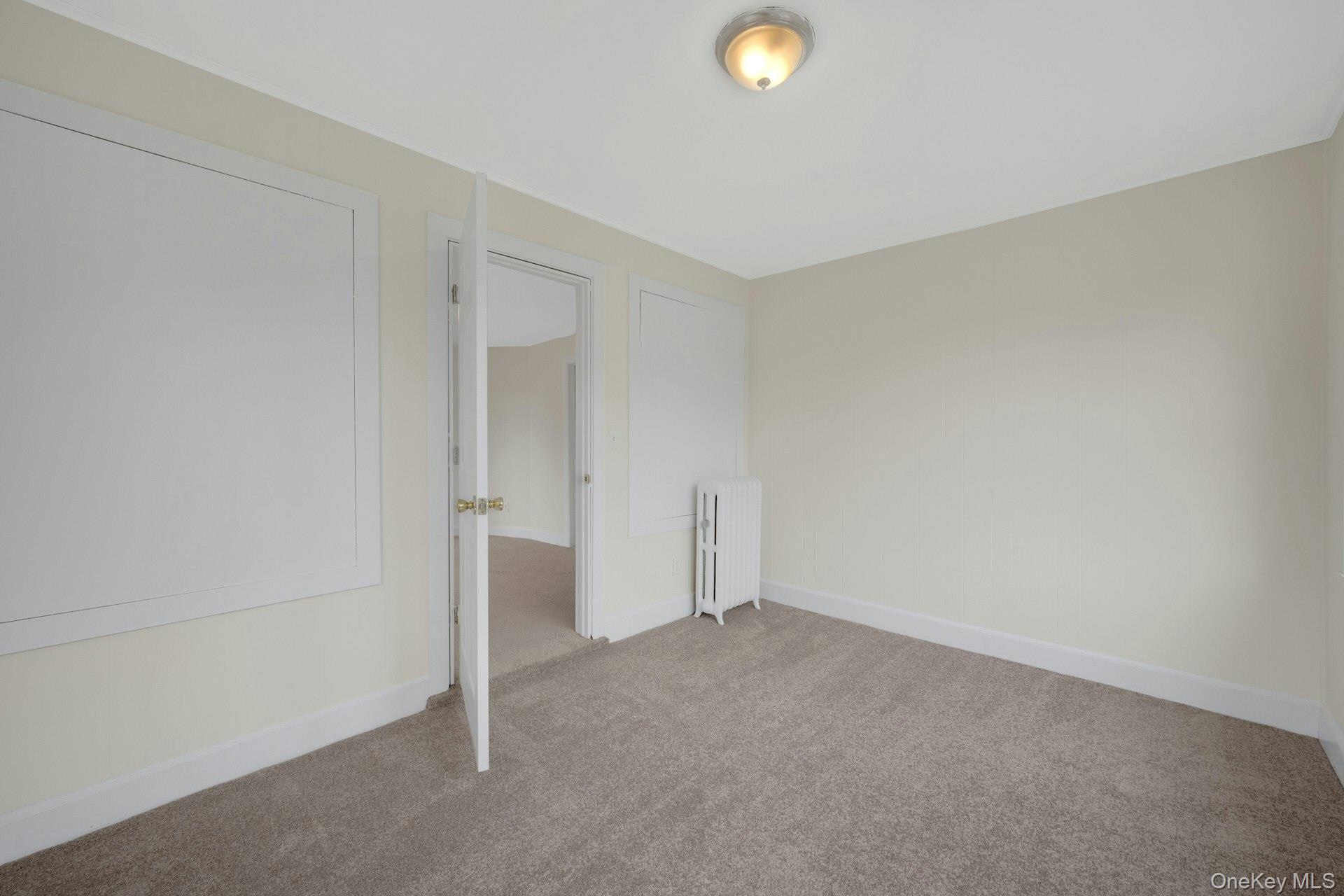 56 Stephenson Boulevard New Rochelle, NY 10801 - Photo 5 of 44 a view of an empty room