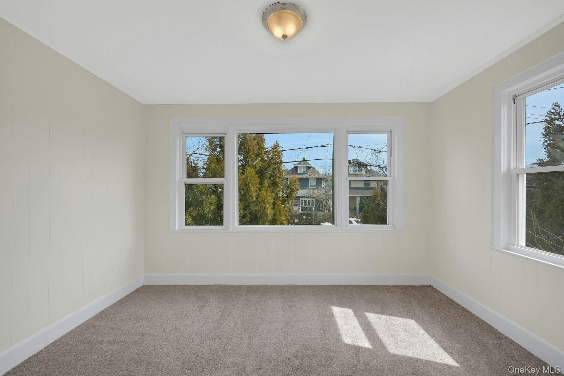 56 Stephenson Boulevard New Rochelle, NY 10801 - Photo 6 of 44 an empty room with windows