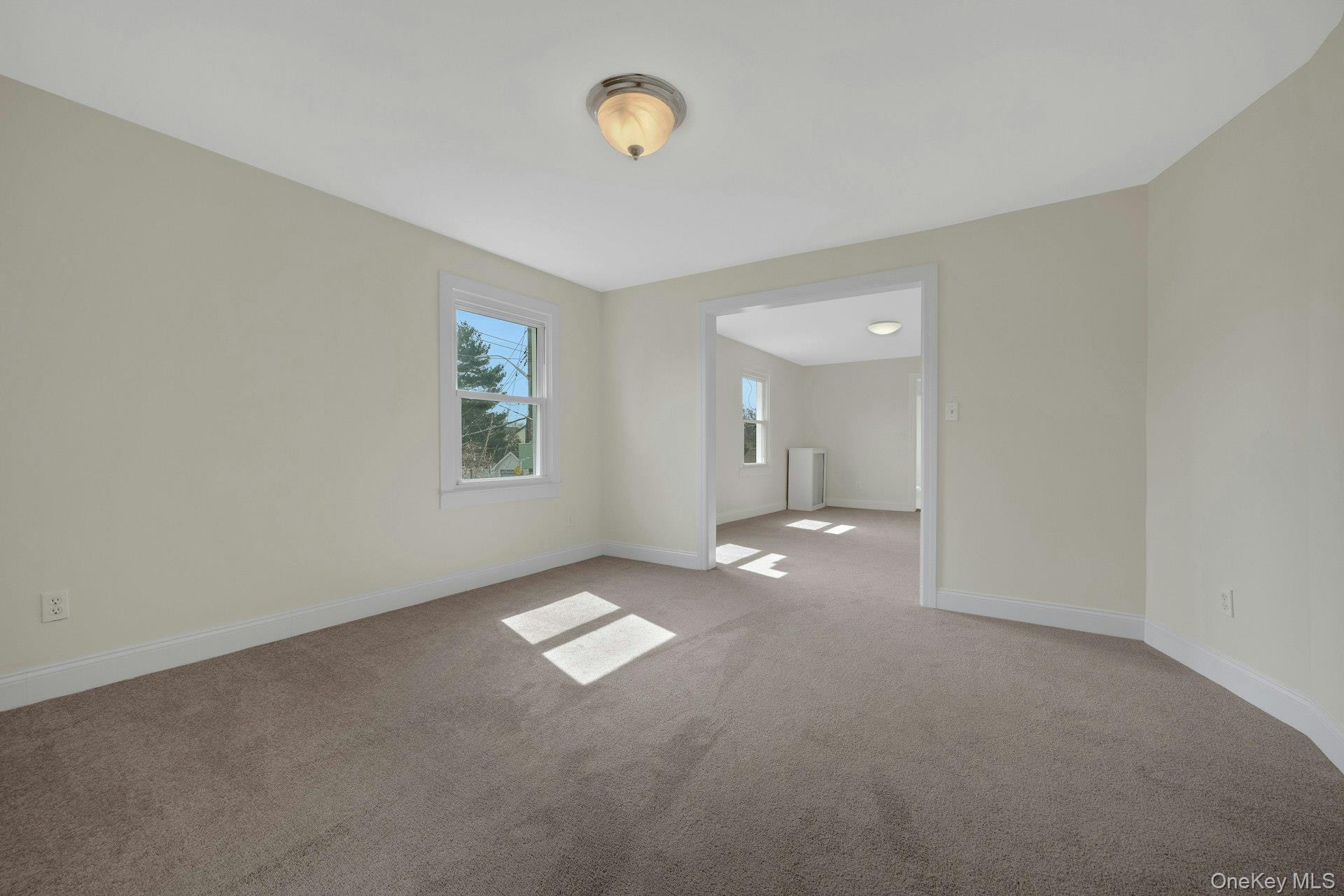 56 Stephenson Boulevard New Rochelle, NY 10801 - Photo 7 of 44 an empty room with windows and closet