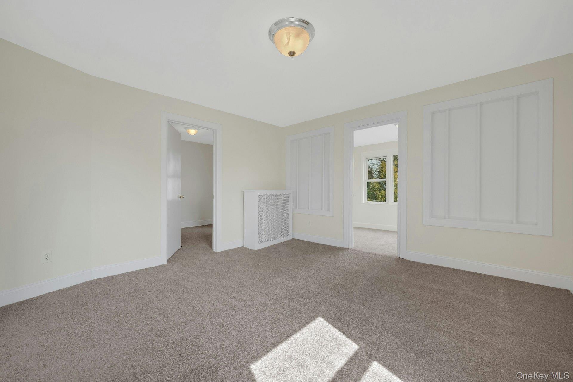 56 Stephenson Boulevard New Rochelle, NY 10801 - Photo 8 of 44 a view of an empty room with a window