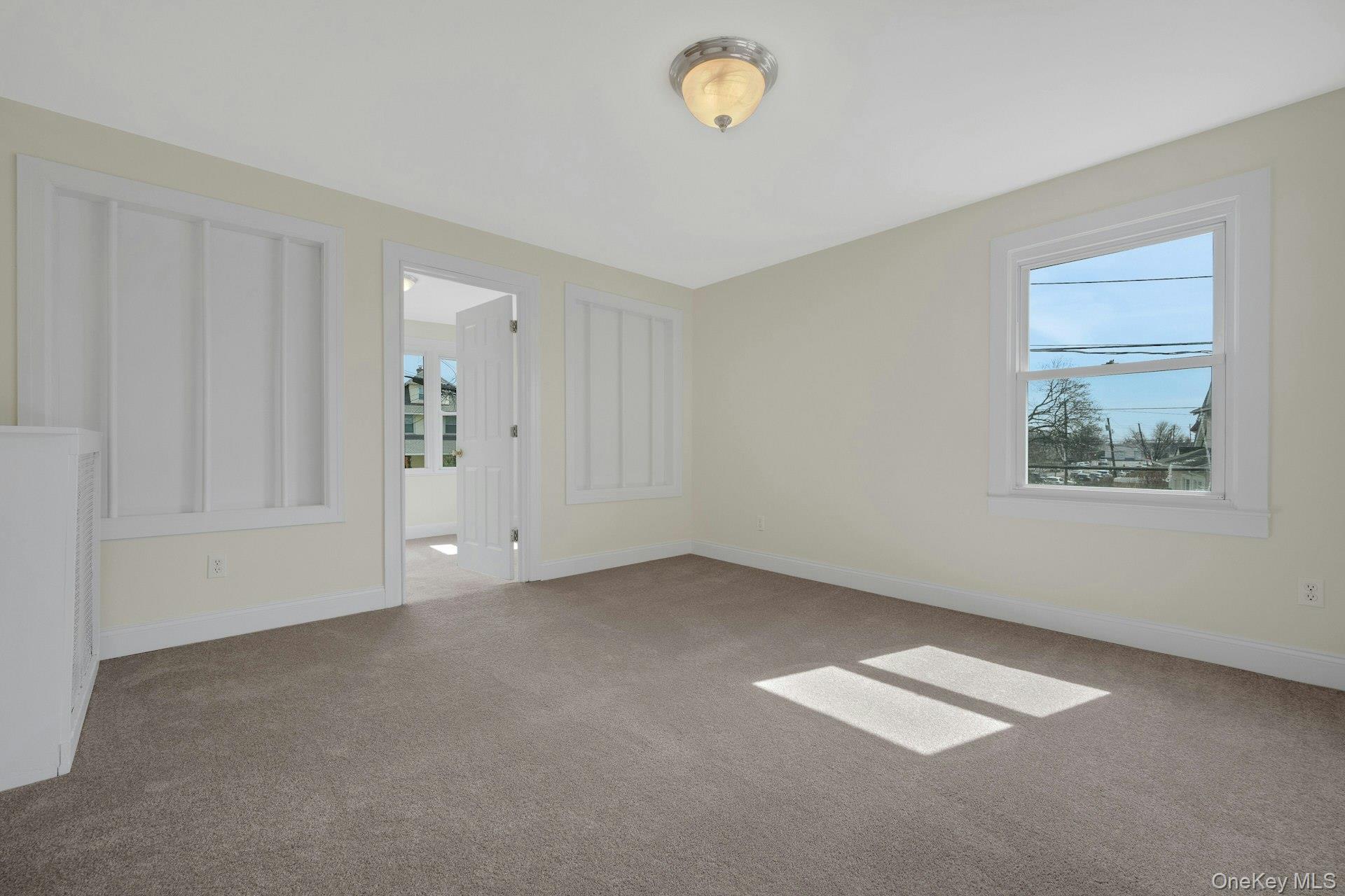 56 Stephenson Boulevard New Rochelle, NY 10801 - Photo 9 of 44 a view of an empty room with a window