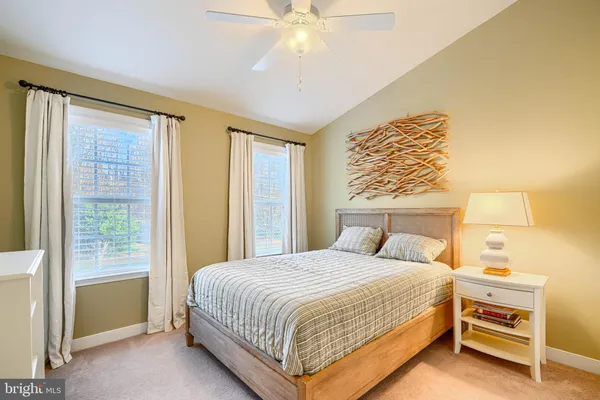 a bedroom with a bed and a closet