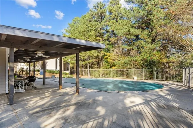 a view of yard with patio