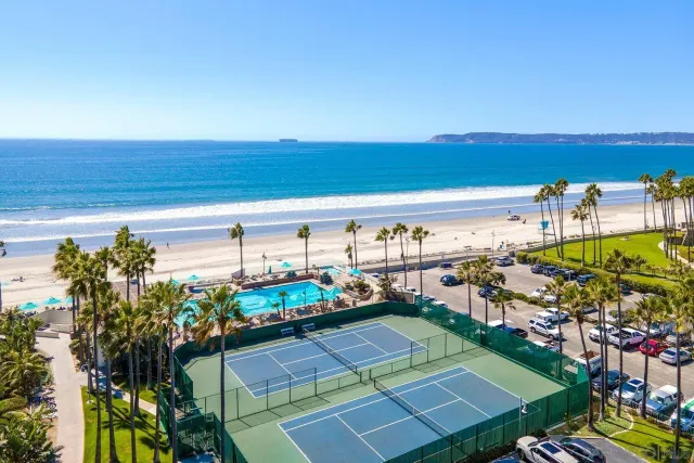 a view of a swimming pool with a chairs