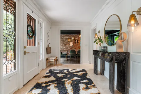 a kitchen with a table and chairs