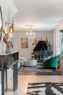 a bathroom with a sink a mirror and vanity
