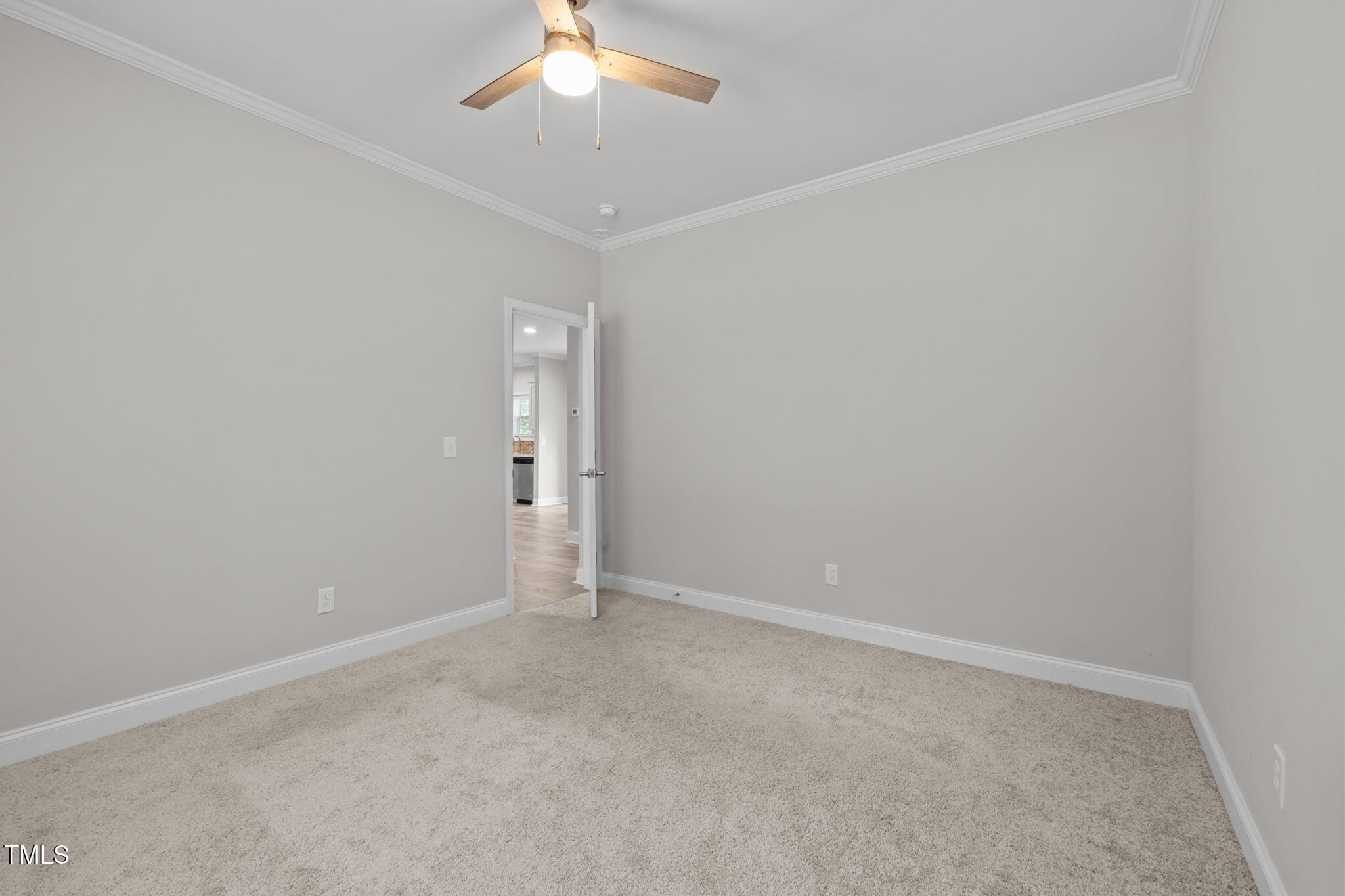 221 Country Lane Timberlake, NC 27583 - Photo 23 of 39 an empty room with a chandelier fan and closet area