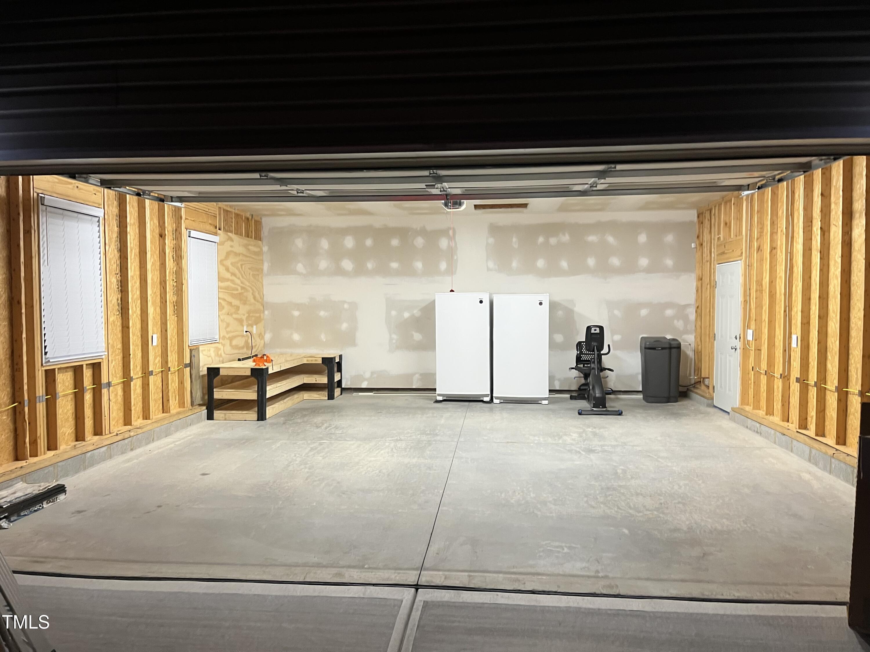 221 Country Lane Timberlake, NC 27583 - Photo 30 of 39 a view of a room with gym equipment and a large window