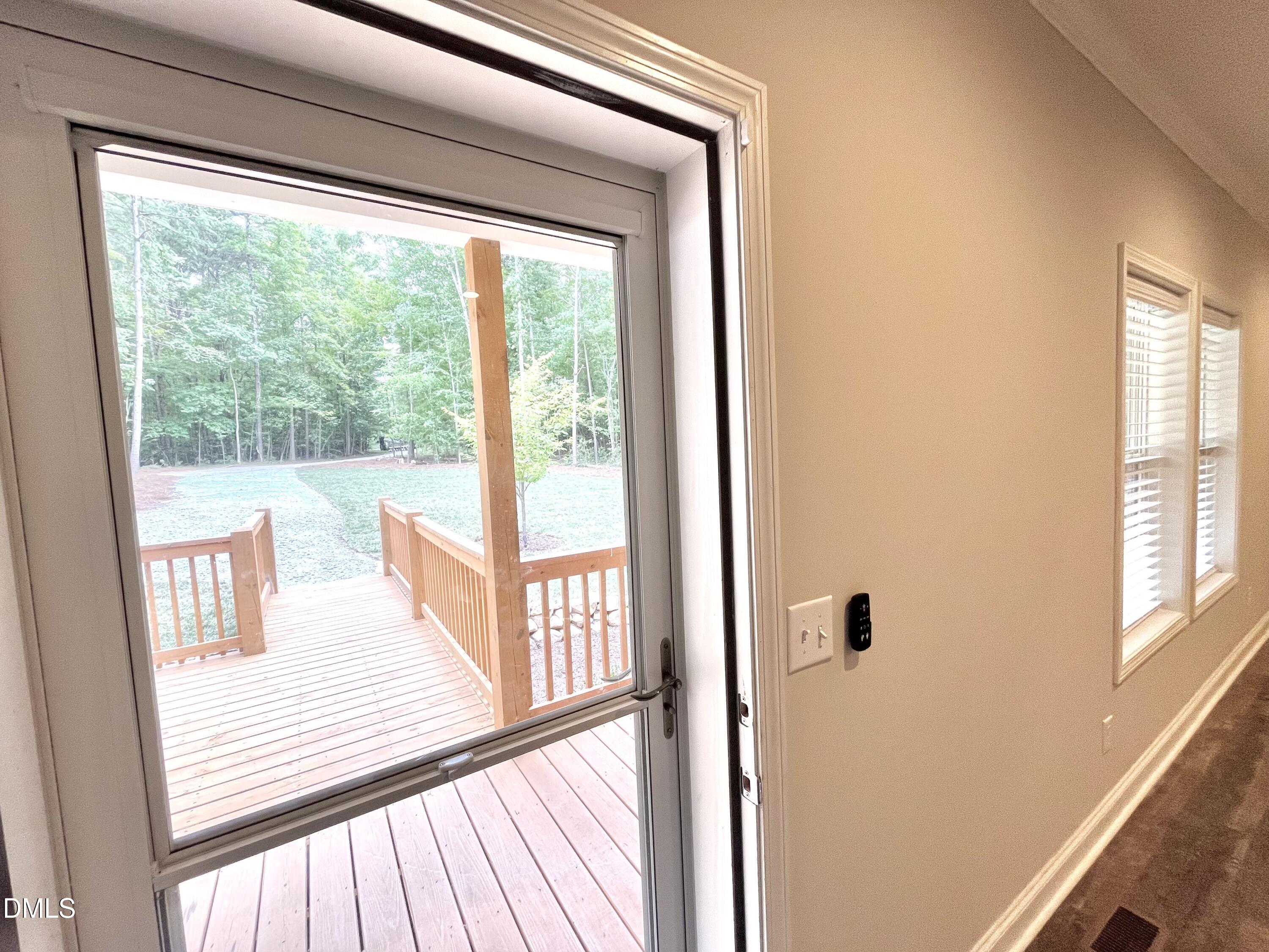 221 Country Lane Timberlake, NC 27583 - Photo 38 of 39 a view of a balcony and wooden floor