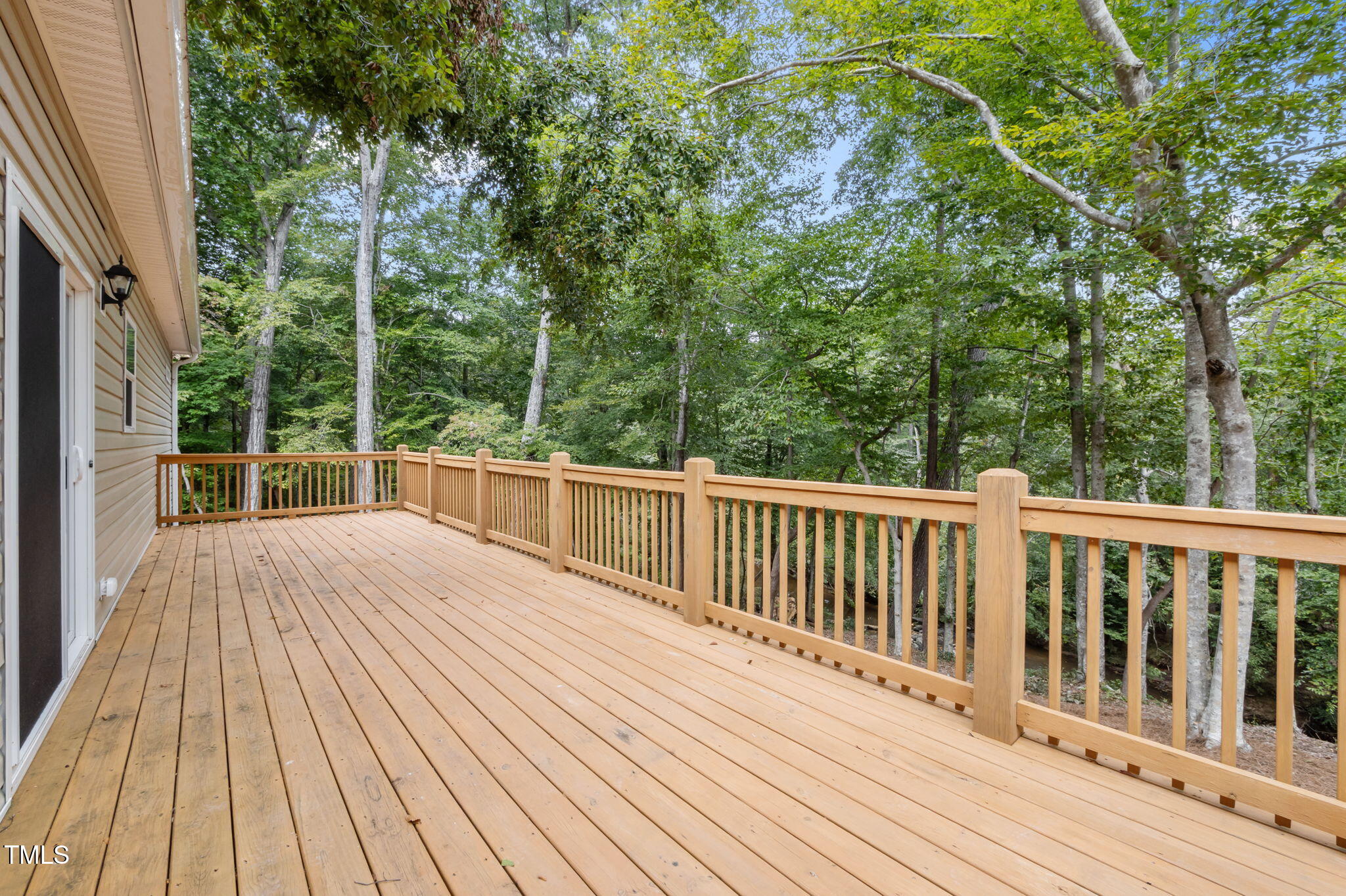 221 Country Lane Timberlake, NC 27583 - Photo 9 of 39 a view of a wooden deck