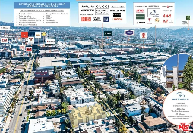 an empty room with wooden floor a fireplace and windows