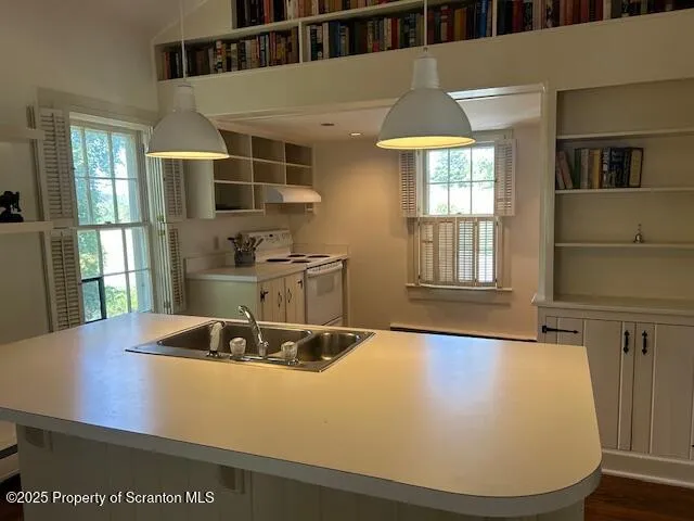 a view of a living room with furniture