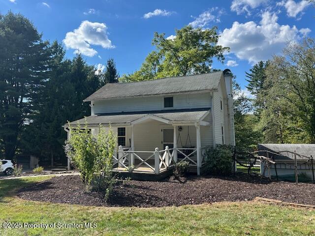 850 B Lily Lake Road Dalton, PA 18414 - Photo 2 of 14 a front view of a house with garden