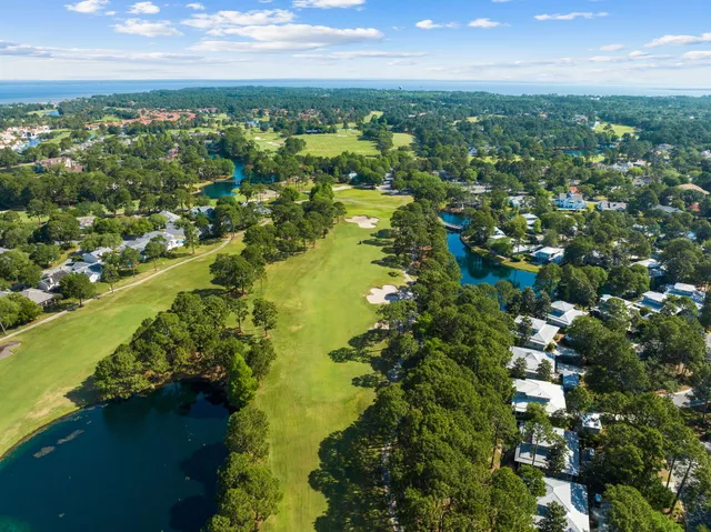 an aerial view of beach and ocean
