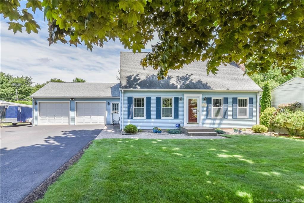 5 Shingle Mill Road Bristol, CT 06010 - Photo 1 of 1 a front view of a house with a yard and porch