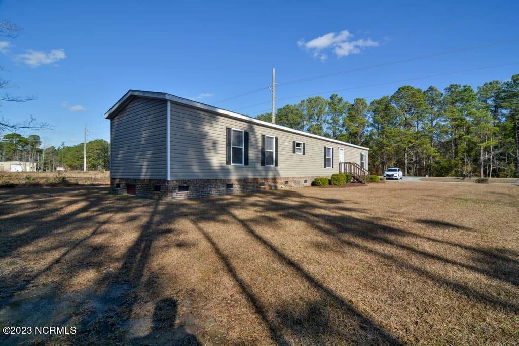 1189 Clariday Road Southwest Calabash, NC 28467 - Photo 1 of 22 front-left