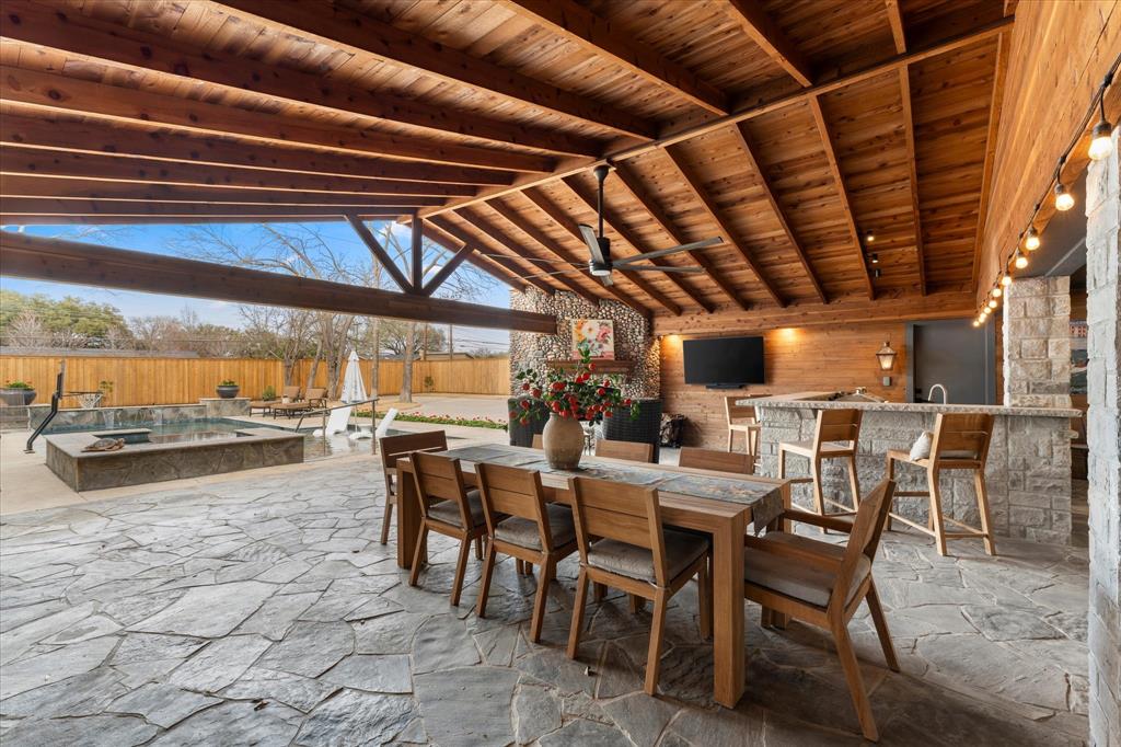5505 Northaven Road Dallas, TX 75229 - Photo 15 of 40 View of patio with an outdoor kitchen, outdoor wet bar, a fenced backyard, and ceiling fan