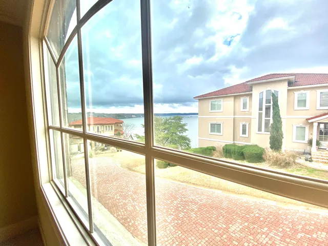 a picture of a living room with a rug