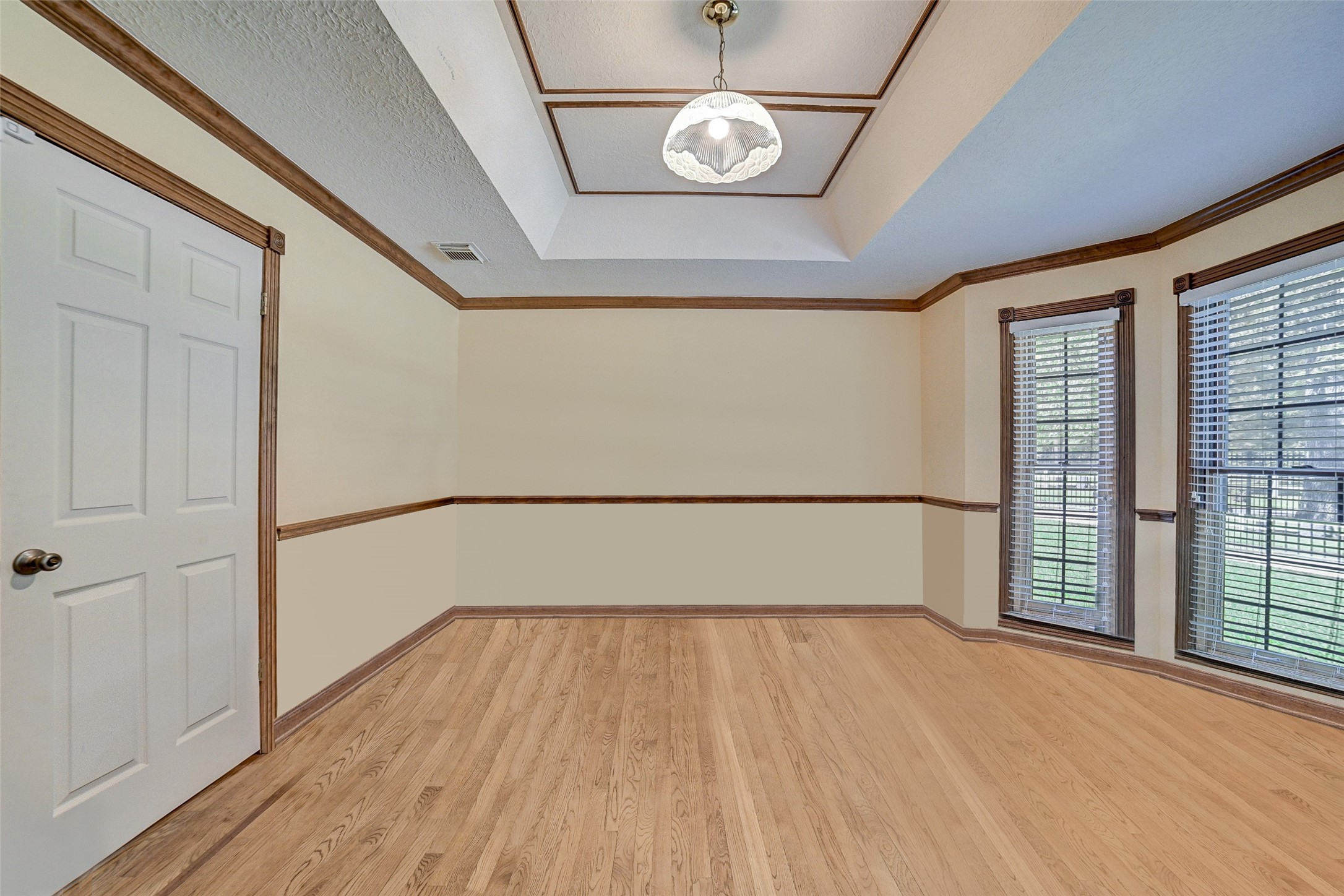 29803 Huffman Cleveland Road Huffman, TX 77336 - Photo 17 of 49 a view of empty room with wooden floor and fan