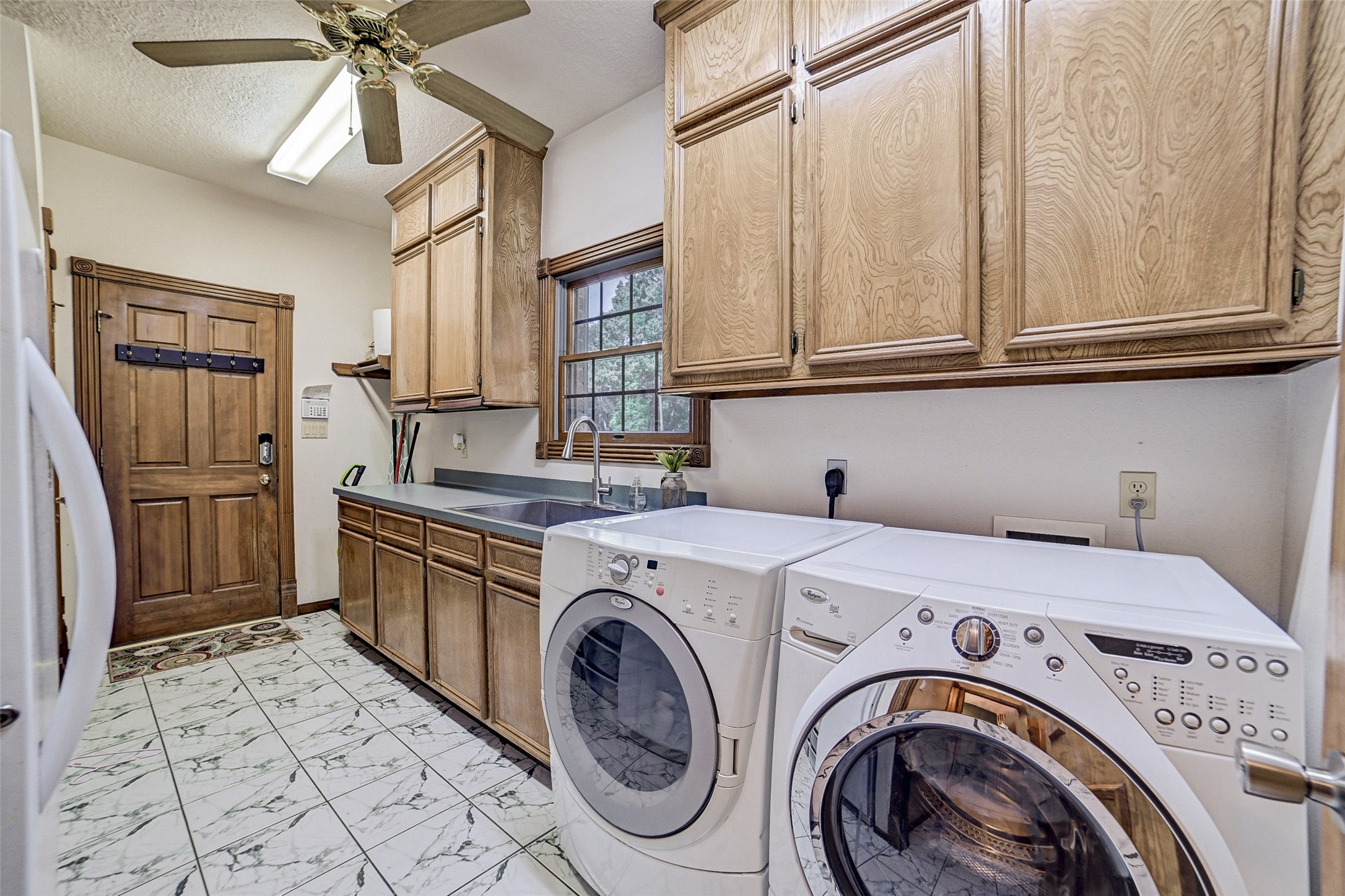 29803 Huffman Cleveland Road Huffman, TX 77336 - Photo 27 of 49 a utility room with closet dryer and washer