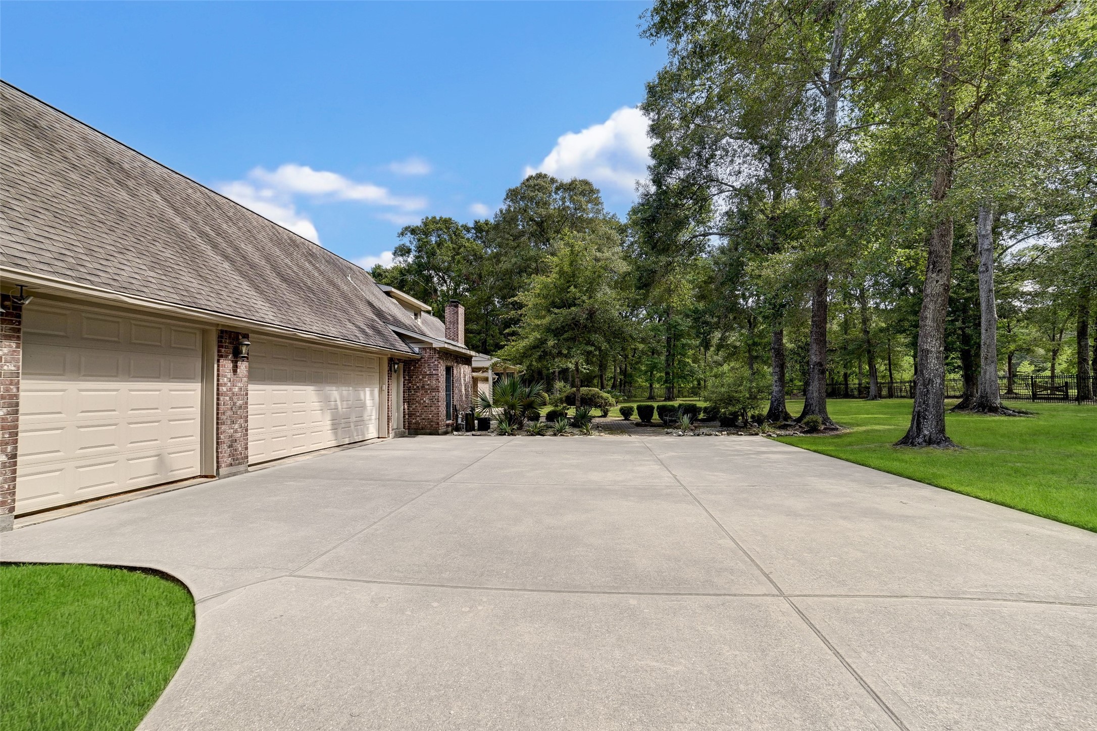 29803 Huffman Cleveland Road Huffman, TX 77336 - Photo 30 of 49 a view of backyard of house and trees