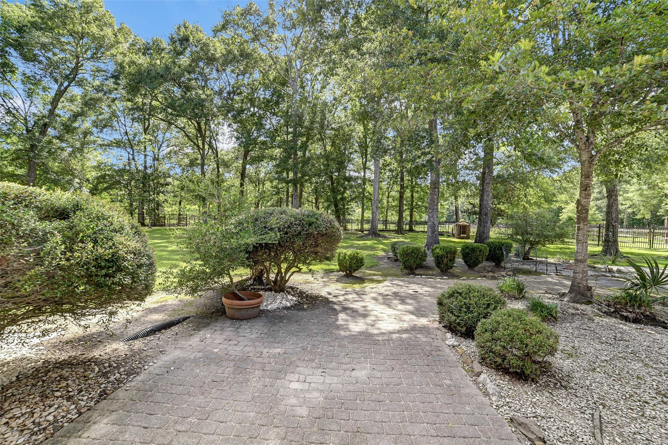 29803 Huffman Cleveland Road Huffman, TX 77336 - Photo 32 of 49 a view of a patio with furniture and garden