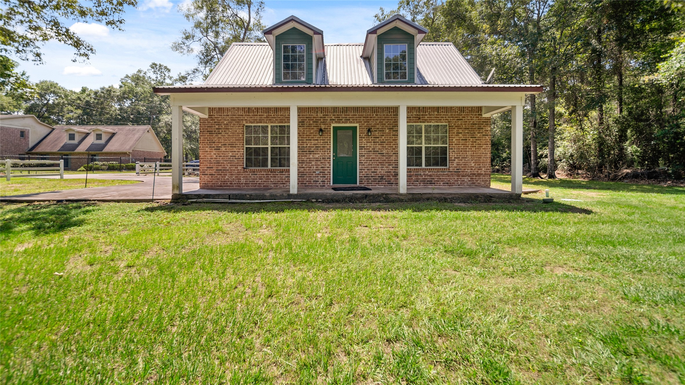 29803 Huffman Cleveland Road Huffman, TX 77336 - Photo 35 of 49 front view of a house with a yard