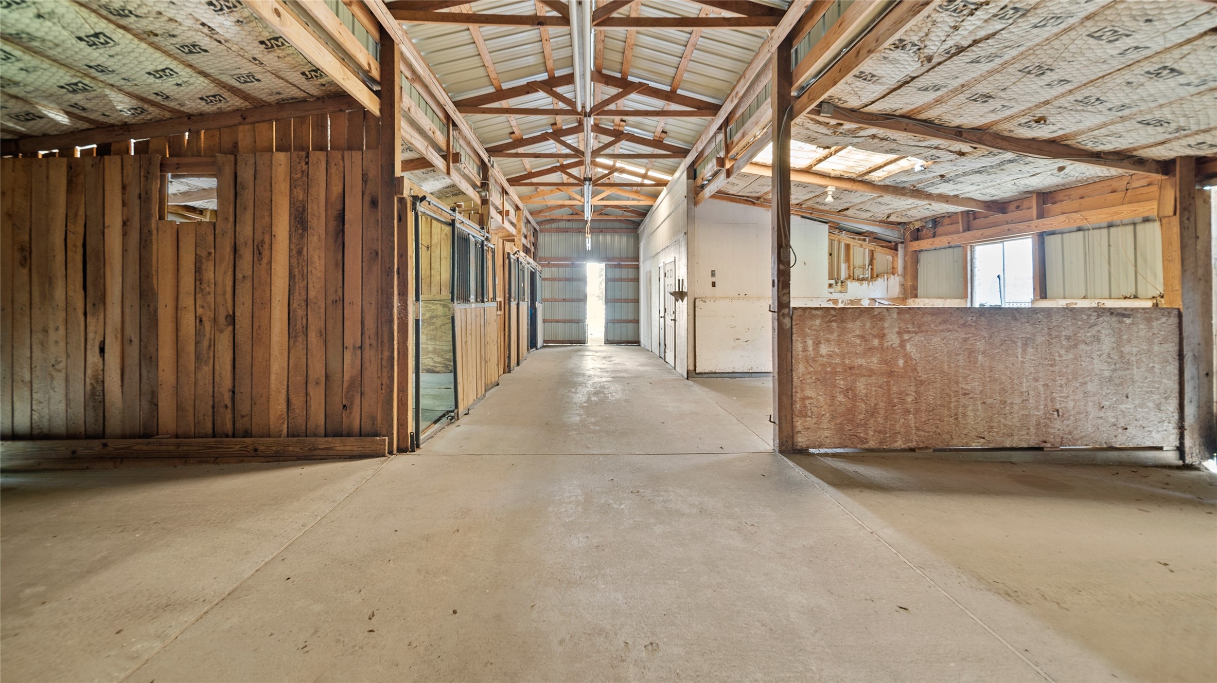29803 Huffman Cleveland Road Huffman, TX 77336 - Photo 40 of 49 a view of a room with wooden walls