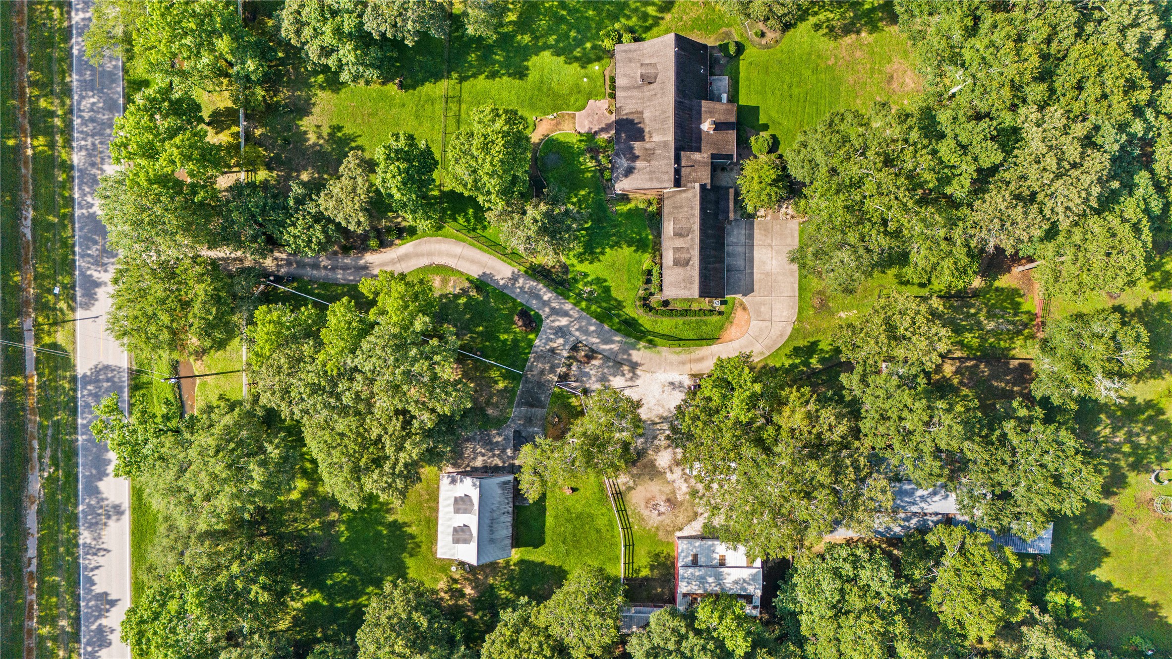 29803 Huffman Cleveland Road Huffman, TX 77336 - Photo 42 of 49 an aerial view of a house with a yard