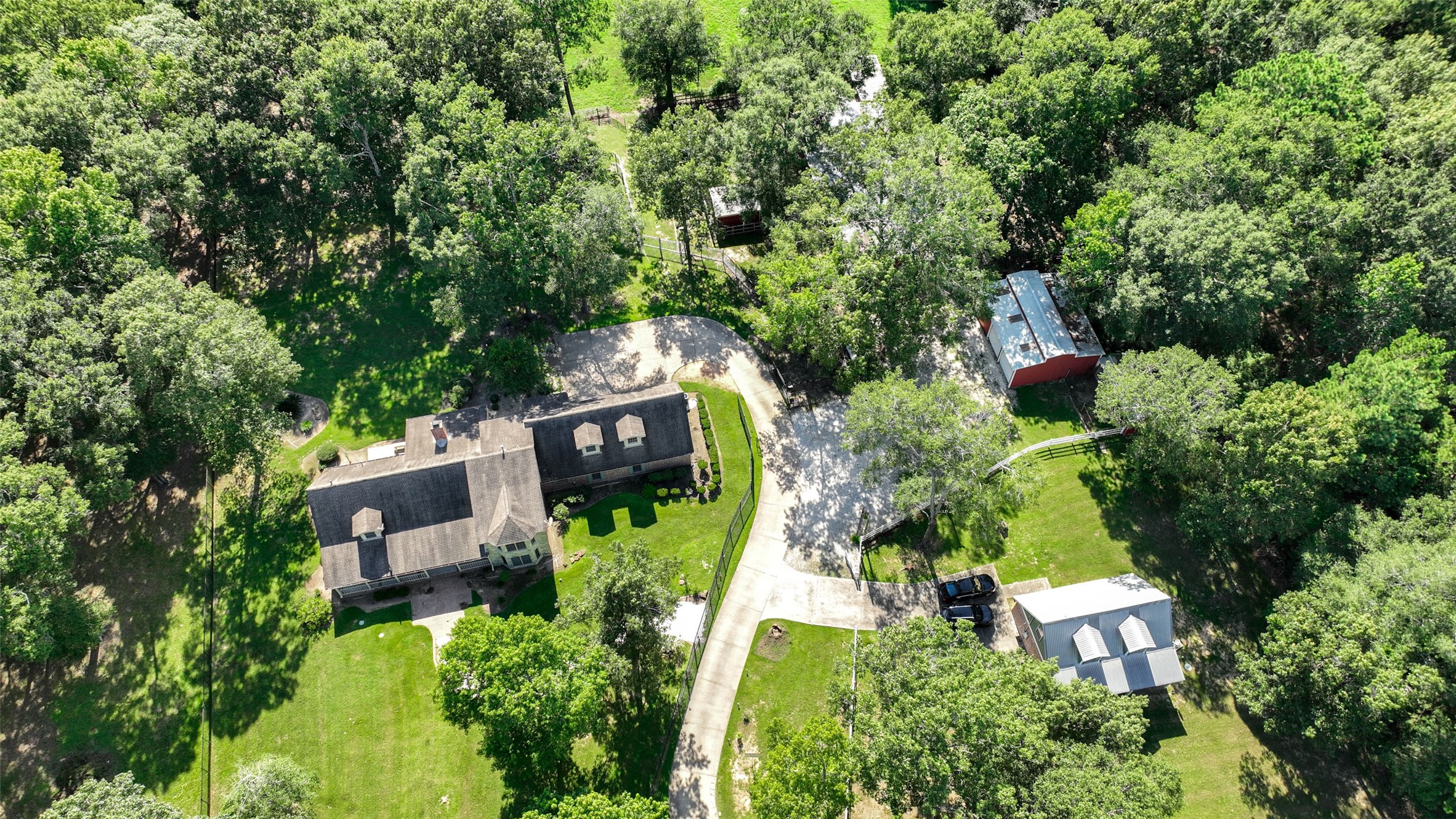 29803 Huffman Cleveland Road Huffman, TX 77336 - Photo 48 of 49 an aerial view of a house with swimming pool outdoor seating and yard